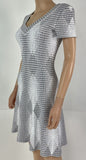 Alaia White Print V-Neck Short Sleeve Fit & Flare Mini Dress