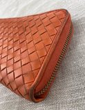 Bottega Veneta Orange Zip Around Intracato Wallet