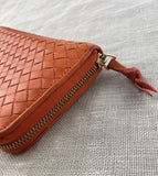 Bottega Veneta Orange Zip Around Intracato Wallet