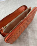 Bottega Veneta Orange Zip Around Intracato Wallet
