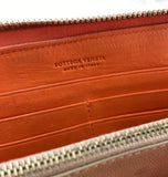 Bottega Veneta Orange Zip Around Intracato Wallet