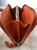 Bottega Veneta Orange Zip Around Intracato Wallet